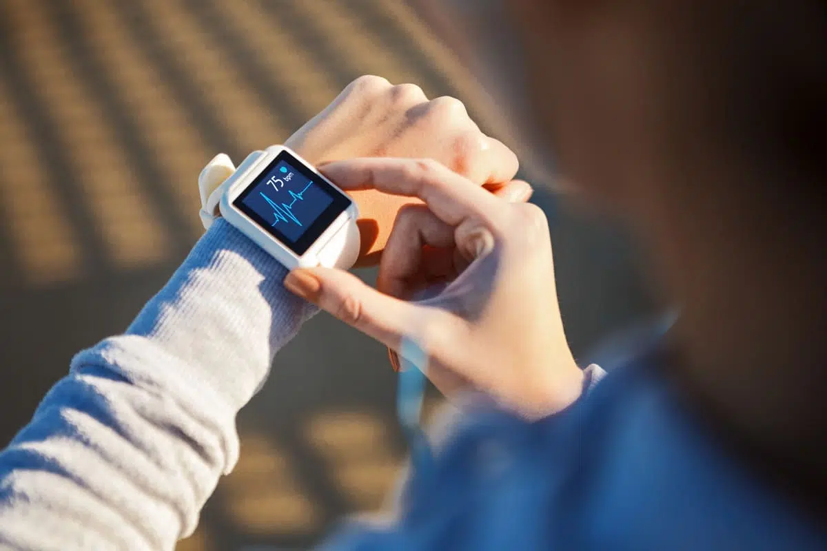 Woman checking her smart watch
