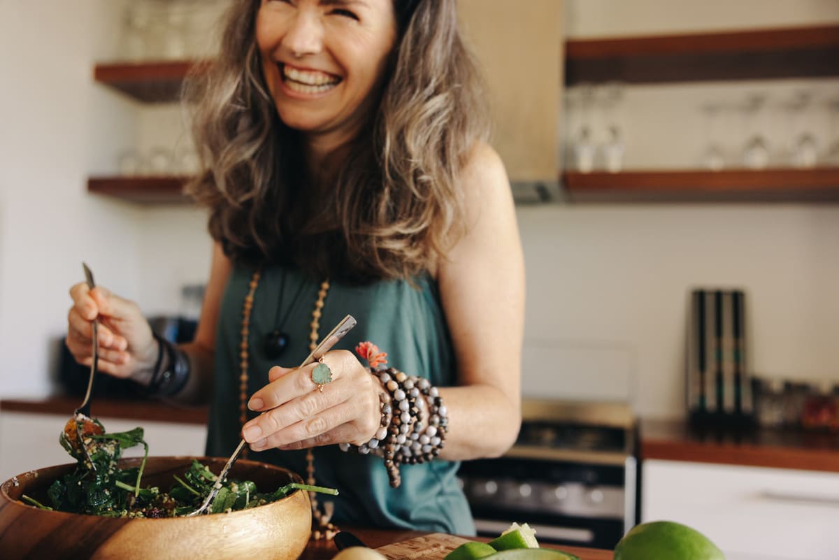 woman making a salad