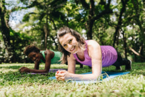 3 Ways to Lift Sagging Breast - Woman doing a pushup or a plank