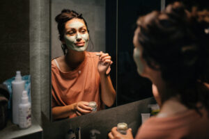 Best face mask, woman apply face cream, moisturizer, great skin