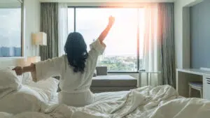 Woman waking up refreshed