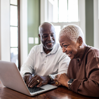 AARP Couple at computer