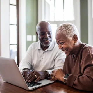AARP Couple at computer