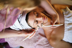 10 Best Skincare Tools for Mature Skin - woman getting skincare treatment at a spa