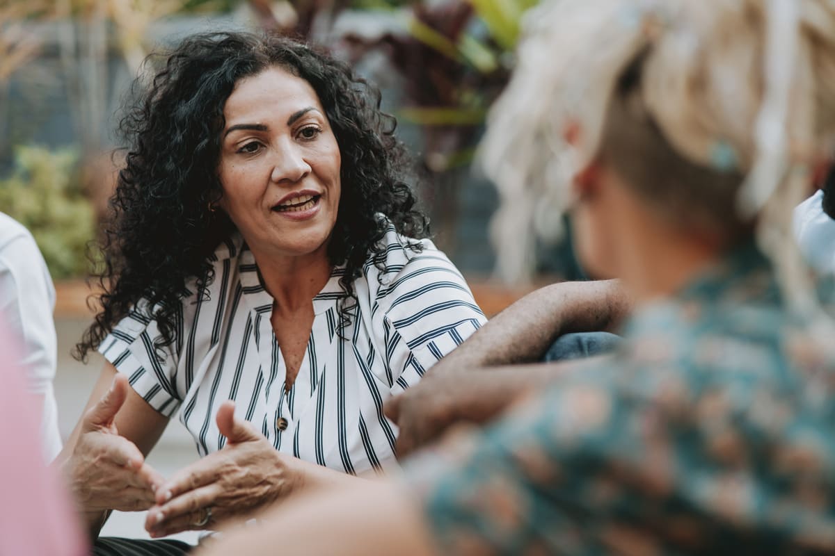 woman talking to friend