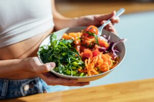 woman eating a salad