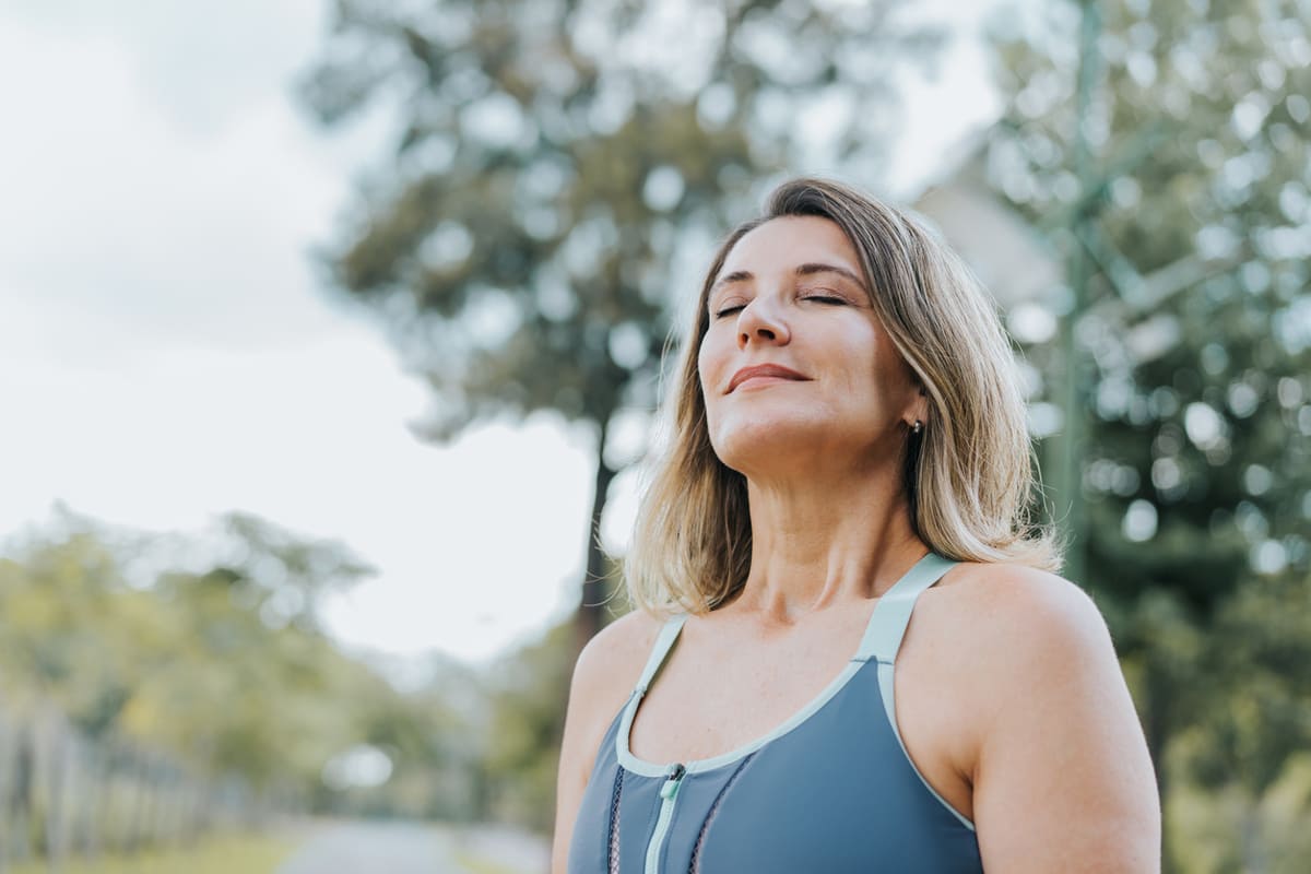 woman breathing after workout