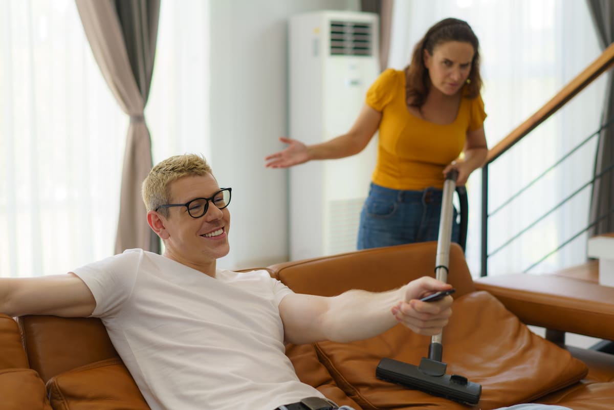 woman angry at lazy man