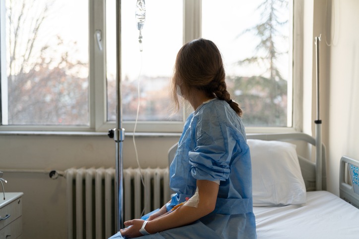 Patient Receiving Serum In Hospital Room. Is skin removal after weight loss covered by insurance?